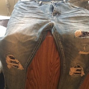 Amiri distressed jeans ..